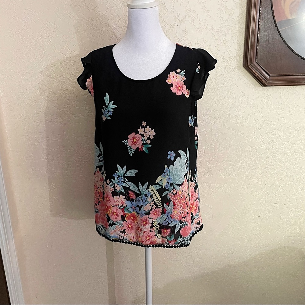 Twine and String floral blouse with tie in back size medium